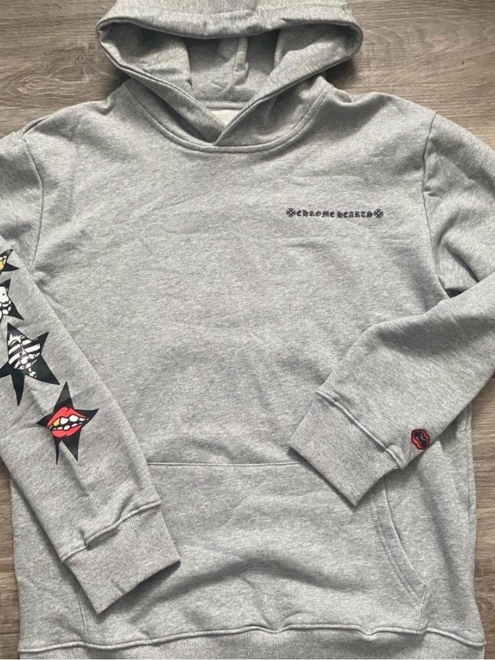 Chrome Hearts Light Gray Hoodie with Star and Lip Sleeve Graphics